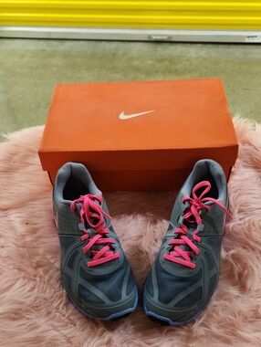 Nike Women's Gray Athletic Sneakers with Pink Laces